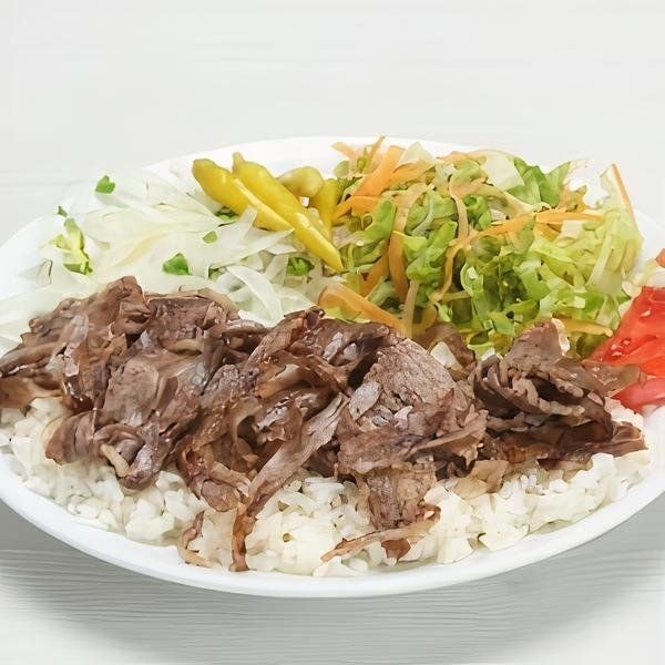 Doner over rice with salad and pickles